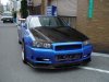 ai18.photobucket.com_albums_b120_JDMUNIVERSECARS_R34blue.jpg