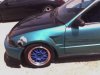 ai18.photobucket.com_albums_b120_JDMUNIVERSECARS_EH2Damage.jpg
